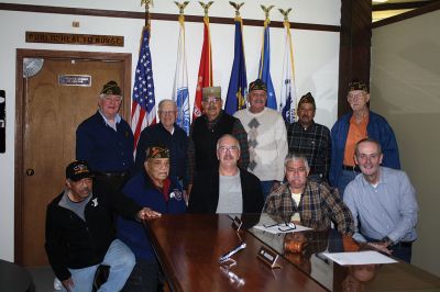 Benjamin D. Cushing VFW Post 2425
Members of the Benjamin D. Cushing VFW Post 2425 were present on Wednesday, December 7, for the signing over of the 465 Mill Street VFW building, marking the official transfer of the building to the Town. Selectmen thanked the gentlemen for their years of service within the town before Post Commander Demi Barros and Rodney Hunt signed the deed. Photo by Jean Perry
