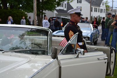 Memorial Day 2014
Scores of Mattapoisett residents gathered in front of the Mattapoisett Free Library the drizzly afternoon of May 26 to pay homage to veteran Americans who lost their lives. Onlookers filled the lawn and spilled out into the street to watch the Memorial Day ceremony with special guest speaker Navy Reserve Commander Paul J. Brawley who served more than 22 years of active duty and reserve service. After the ceremony, participants paraded through the town to the town wharf. Photo By Jean Perry
