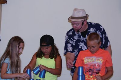 Minecraft Magician 
It was all about “Building a Better World” on August 14 during a children’s performance sponsored by the Plumb Library and the Rochester Cultural Council. Performer “Jungle Jim” Manning merged Minecraft with magic and built a blast of a time with the kids. Photos by Jean Perry
