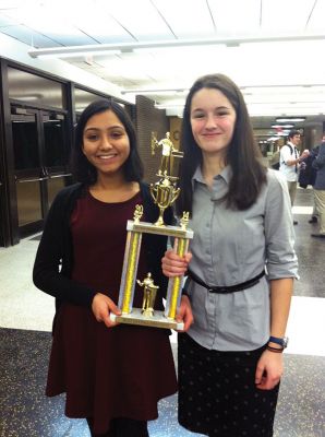 ORR Debate Team
Ruhi Raje (left) and Emily Audet (right) were the top undefeated affirmative team in eastern MA. They also won the final championship debate and were awarded this impressive trophy. Photo by Nicholas Bergstein.
