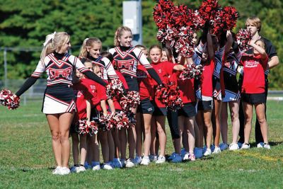 ORR Cheer!
Saturday September, 26th,during the home game against Bourne the ORR varsity cheerleaders performed a halftime routine with tri town future cheerleaders. The elementary age cheerleaders took part in a clinic, offered by the ORR cheerleaders in August where they learned some cheers, jumps and a half time routine. The varsity cheerleaders have plans to offer this clinic again during the basketball season. Photo taken by Rick Manning. 
