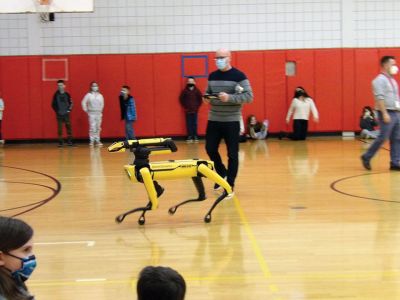 Spot
Kevin Garell from Boston Dynamics brought a robot named "Spot" for a lively demonstration at Rochester Memorial School. With assistance from his son Gavin, Mr. Garell showed off some of Spot's "training" and capabilities. The demonstration was the culmination of a series of projects during which Grade 6 students took on a challenge from NASA to design robotic devices with specific functions. The visit and associated lessons were coordinated by Grade 6 teachers Photo courtesy Erin Bednarczyk
