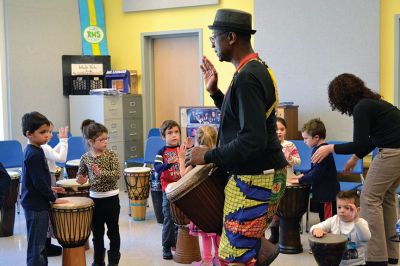 Otha Day
Drum master Otha Day spent the day with Rochester Memorial School students on November 21, giving lessons on rhythm and handing out percussion instruments, including drums and shakers, during drumming workshops held throughout the day. Photos By Jean Perry
