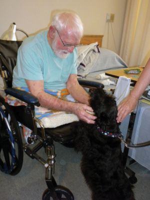 Pet Therapy
Bruce Miller loves spending time with Abby, a Scottish Terrier and Therapy dog who visits patients at the Sippican Health Center in Marion every Friday.  Photo by Joan Hartnett-Barry.

