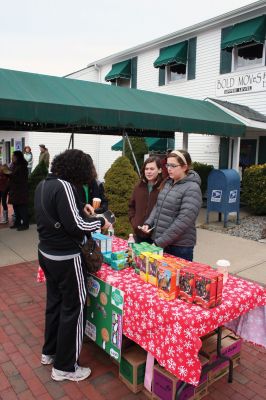 Plumb Corner Holiday
Lauren Valente and Kelly Bruce sell Girl Scout cookies to merry Rochester residents at the December 10 Plumb Corner Holiday Celebration. Photo by Robert Chiarito.
