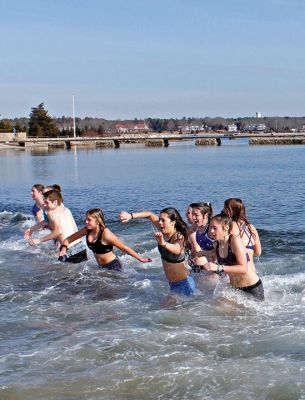 Tabor Academy Polar Plunge
Tabor Academy hosted its second annual Polar Plunge on Sunday, January 21 at Silvershell Beach to raise money for the school’s Special Olympics Young Athletes Program. Students from ‘fundraising rival’ Sandwich High also showed up, with scores of students and staff making a dash in and quickly out of the chilly waters. The plunge raised about $8,000. Photos by Deina Zartman
