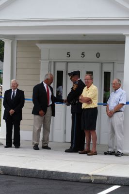 Police Dedication
The public was invited to a building dedication and ceremony for the new Marion police station on July 10, 2010. The town appropriated $3.8 million for the new building, which replaces the old police station on Spring Street. Among those in attendance were Police Chief Lincoln Miller, the Marion police department, the Board of Selectmen, Town Administrator Paul Dawson, Plymouth County Sheriff Joseph McDonald and members of the Police Station Building Committee. Photo by Anne OBrien-Kakley.
