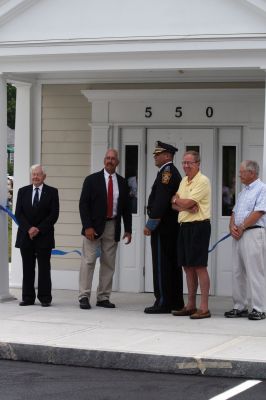 Police Dedication
The public was invited to a building dedication and ceremony for the new Marion police station on July 10, 2010. The town appropriated $3.8 million for the new building, which replaces the old police station on Spring Street. Among those in attendance were Police Chief Lincoln Miller, the Marion police department, the Board of Selectmen, Town Administrator Paul Dawson, Plymouth County Sheriff Joseph McDonald and members of the Police Station Building Committee. Photo by Anne OBrien-Kakley.
