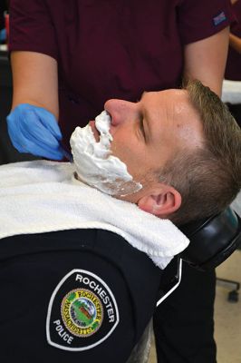 No Shave November
Time was up for five Rochester police officers participating in the department’s 2nd annual No Shave November who said farewell to their beards and goatees as cosmetology students at Old Colony treated the officers to a shave on December 1. Photos by Jean Perry

