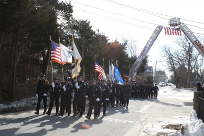 Service for Lt. Paul Silveira
Police officers from throughout the SouthCoast, including Mattapoisett, Marion, Rochester, Acushnet, New Bedford and Dartmouth, marched in procession to Cushing Cemetery for the funeral of Detective Lt. Paul Silveira on Thursday, January 20, 2011. Mr. Silveira, who had served on the Mattapoisett Police Department since 1984, died unexpectedly of a brain aneurysm on January 14, 2011. Photo by Laura.

