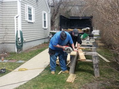 Ramp Construction
Andy Bobola of the Mattapoisett Building Department, Bruce Rocha Jr. of Fisher and Rocha and the Mattapoisett Lions Club recently collaborated on building this handicap ramp 
