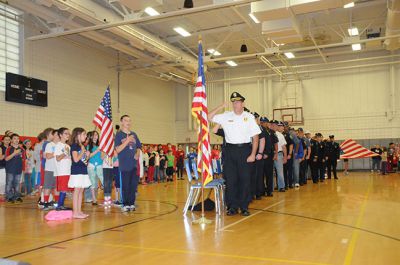 Flag Day Ceremony 
Rochester Memorial School 4th Grade held an all school Flag Day ceremony on June 14th honoring and thanking community first responders.  Commencing this energy filled event was the raising of the flag to the National Anthem followed by the Pledge of Allegiance.  Acknowledgements to a fantastic show of local and state police, fire fighters, EMT’s, veterans and serving military heroes was presented through 4th grade students and famous poems, songs and personal thank yous. Photos courtesy of Ilana Mackin

