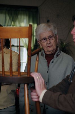Antiques in Rochester
Frank McNamee, antiques expert, appraises the American Windsor Arrowback chair that Shirley Hartley brought to the November 29, 2009 Rochester Womens Club Antiques and Collectibles show. Photo by Felix Perez.
