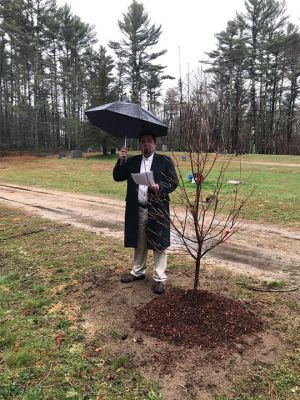 Arbor Day 2018
The Town of Rochester held a rainy Arbor Day 2018 ceremony at Hillside Cemetery on Friday. Tree Warden Jeff Eldridge planted five dogwood trees along the edge of the cemetery, lining the road. Here, an appropriately dressed Matthew Monteiro presents the trees to the town. Photo courtesy Matthew Monteiro

