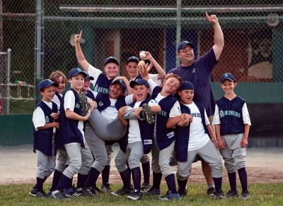 Rochester Youth Baseball 
The Rochester Youth Baseball Mariners celebrate a victory against the As in the first game of the 2010 season. Photo courtesy of Leo Pallatroni.
