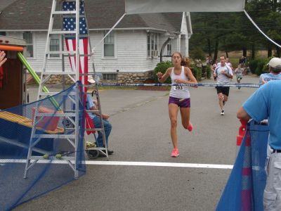 Rochester Road Race
19-year-old Annalise Vander Baan of Uxbridge, MA was the first female to cross the finish line at the 7th Annual Rochester Road Race on Saturday, August 11.  Her time was 20:11.Photo by Katy Fitzpatrick.
