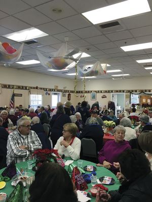 Rochester Council on Aging
The Rochester Council on Aging hosted its annual New Year’s Eve luncheon and celebration on December 31. Nearly 100 people enjoyed mellow music provided by local artist Rick LeBlanc and plates heaped with Chinese food. Photo by Marilou Newell
