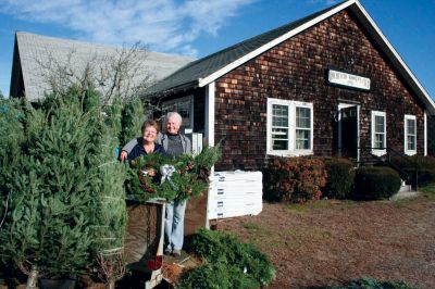 Tree Sales
Rochester Women's Club members Nancy Boutin and Marsha Hartley helped sell wreaths and trees at the Clubhouse on November 26, 2011. The sale, which will continue the next two weekends, will help to finance a new roof for the aging clubhouse. Photo by Robert Chiarito.
