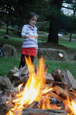 Moonlight Soiree
S'mores, campfires, spooky stories and fun were a part of Salty's Moonlight Soiree on October 22, 2011 at Dunseith Gardens. The annual kids' event is hosted by the Mattapoisett Land Trust. Photo by Felix Perez.
