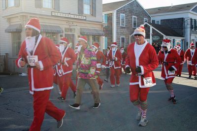 Santa Run 
Saturday, December 7, was the Santa Run 5k through the village of Mattapoisett. Usually held in New Bedford, race organizer Geoff Smith moved the race to Mattapoisett, flooding the village streets with hundreds of Santas – and a few Christmas miniature horses, as well. Photos by Jean Perry
