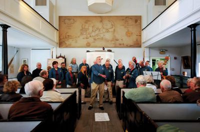 New Bedford Harbor Sea Chantey Chorus 
The New Bedford Harbor Sea Chantey Chorus visited the Mattapoisett Museum and Carriage House on April 21 to share songs that reflect the rich maritime heritage of the region. The chorus of more than 40 members boasts a repertoire including chanteys, ballads, and ditties of sailors, whalers, and coastwise fisherfolk. Photo by Felix Perez. 
