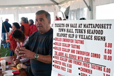 Harvest Moon Seafood Festival
ZBA member Ken Pacheco helped collected money and pass out tickets at the first Harvest Moon Seafood Festival, organized by the Town of Mattapoisett and the Mattapoisett Police Officers Association, held on Sunday, October 14, 2012, at Shipyard Park.  Photo by Eric Tripoli.
