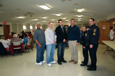 Senior Holiday 
Left to right: retired officer George Pina, Sgt. Jeff Tripp, Officer Anthony DiCarlo, Police Chief Lincoln Miller, Officer Alishia Chandler and Sgt. Rich Nighelli of the Marion Police Brotherhood were on hand as the Brotherhood hosted a holiday dinner for seniors at the Marion Social Club on Saturday afternoon, December 17, 2011. Photo by Robert Chiarito.
