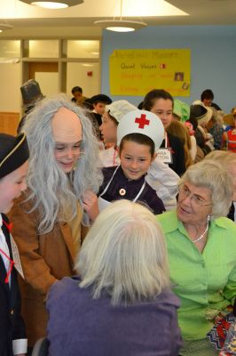 Seniors Appreciation at Center School
One of the highlights of the third-grade school year, students dressed up as famous Americans and treated senior citizens from the Council on Aging to a senior citizen appreciation breakfast the morning of June 6. The third-graders sang patriotic songs like the Star-Spangled Banner and My Country ‘Tis of Thee, dressed as the American figure of their choice. Photo by Jean Perry
