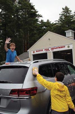 Car Wash
Grade 6 at Sippican Elementary School students turned a dreary Saturday into some fun while washing cars at Marion Fire Station 2 to raise money for their spring-season class trip. Photos by Mick Colageo
