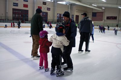 Scout Fundraiser
A local man and his children skate at the ice rink at Tabor Academy on Sunday, February 3.  Cub Scout Pack 32 of Marion held a skating fundraiser to raise money to help off-set the costs of various trips and activities they participate in throughout the year.  Photo by Eric Tripoli.
