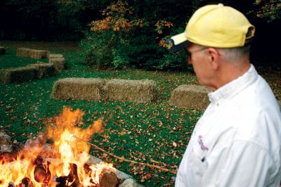 Salty Soiree
MLT member Paul “Ozzie” Osenkowski toasts a marshmallow over the fire during the annual Salty Soiree on October 20, at Dunseith Gardens in Mattapoisett. Photo by Eric Tripoli
