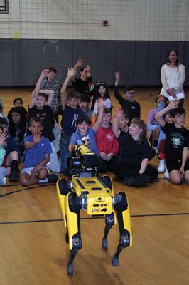 Spot
"Spot," a sophisticated, battery-operated, remote-control robot, is capable of going into places unsafe for humans like mines and outer space and transmitting live video and information. Spot, who can carry 35 pounds of equipment, entertained Rochester Memorial School students with his dance moves during two presentations held on Tuesday afternoon. Photo by Mick Colageo - April 25, 2024 edition
