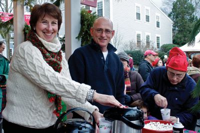 Marion Holiday Stroll
Bernadette Kelly and Paul Grover of Robert Paul Properties distributed free hot chocolate and mini-marshmallows to residents during the annual Marion Holiday Stroll on Sunday, December 9.  Photo by Eric Tripoli
