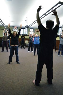 World Tai Chi and Qigong Day
A group in Mattapoisett joined others across the globe in celebrating World Tai Chi and Qigong Day on April 26 at 10:00 am, just as other groups did at 10:00 am in their local time zones. Led by Tai Chi Practitioner Colman Fink, 15 locals moved gracefully together with conscious breath in the downstairs of the Mattapoisett Free Library – thanks to the rain that dampened the plan to meet at Ned’s Point for a second year in a row. By Jean Perry
