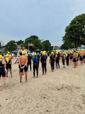 Mattapoisett Triathlon
The Mattapoisett Triathlon took place on Sunday, July 27. The event, hosted by the Mattapoisett Lions Club, saw over 100 competitors begin from Town Beach, swim 0.25 miles, bike 10 miles north of town and back, and finally run a 5K past Ned’s Point and back around to the beach. Photo by Robert Pina
