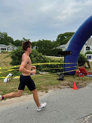 Mattapoisett Triathlon
The Mattapoisett Triathlon took place on Sunday, July 27. The event, hosted by the Mattapoisett Lions Club, saw over 100 competitors begin from Town Beach, swim 0.25 miles, bike 10 miles north of town and back, and finally run a 5K past Ned’s Point and back around to the beach. Photo by Robert Pina
