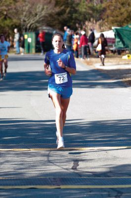 Marion Turkey Trot 5K Road Race
Woman’s first place finisher, Julie Craig, of Mattapoiset. Photo by Felix Perez
