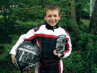 F1 Racer
On June 18, 10-year old Dylan Villa of Marion competed in the F1 Boston Racing Championships and won first place in his division. Mr. Villa has been racing at F1 for the past two years, and has competed in three championships. The young racer hopes to eventually own his own race-car and compete at the larger tracks in the area. Photo courtesy of Terri Villa.
