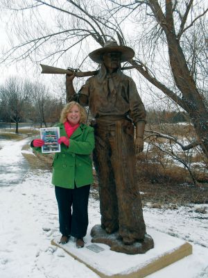 Loveland, Colorado
Michelle "Miki" McGreevy, Mattapoisett residen, is a Wandering Wanderer. Here, Ms. McGreevy poses with a copy of The Wanderer during her February 2010 trip to Loveland, Colorado where she visited the Benson Sculpture Garden. Photo courtesy of Ms. McGreevy.
