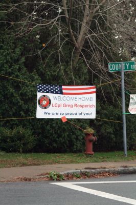 Welcome Home
A banner on the corner of Route 6 and North Street welcomes Mattapoisett resident and Marine Lance Corporal Greg Rosperich. Mr. Rosperich is home with his family for Thanksgiving before having to return to his station in North Carolina. Mr. Rosperich will likely return to Afghanistan one more time before his tour of duty is complete. Photo by Anne OBrien-Kakley.
