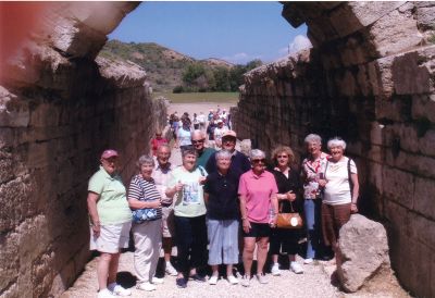 Mattapoisett Touring Club
The Mattapoisett Touring Club recently visited Greece, where they took a photograph in front of the Arch Gateway to the Olympic Stadium, the site of the first Olympic Games in Olympia, Greece. Photo courtesy of Kay Levine.
