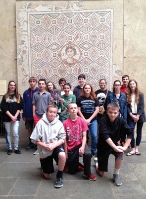 Worcester Art Museum
“During a guided tour of the Greek and Roman artifacts on display at the Worcester Art Museum, some of Mrs. Tilley’s 8th grade Latin students pause for a group photo in front of the remains of a floor mosaic excavated from a Roman house. Photo by Marcy Smith
