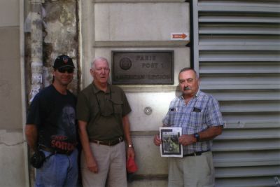 Americal Legion Post 1
Bob Lopes (right), his son Steve Lopes (left), and Warren Ide of New Bedford stand beside the original Americal Legion Post 1 in Paris. The post was organized after the First World War.
