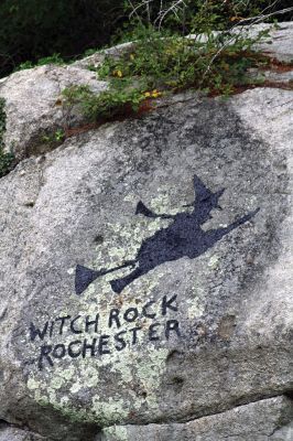 Witch Rock
The writing on Rochester’s famous “Witch Rock” has received a fresh coat of paint just in time for the Halloween season. The legend of the great rock, located on private property at the corner of New Bedford Road and Vaughan Hill Road, speaks of a witch hanging at the site, and the native Indians are said to have believed that the spirit of a witch dwells inside the rock and one could hear her cackle and scream on nights of the full moon. Photo by Jean Perry - October 13, 2016 edition
