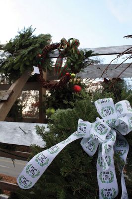 Sole Survivor
Tri-Town Relay for Life team “Sole Survivor” held its annual wreath sale over the holiday weekend at the old Al’s Yankee Clipper on Route 6 in Marion. Wreaths, as well as handmade kissing balls and evergreen decorations will remain on sale on Saturday and Sunday until Christmas or until supplies run out – and they are going fast! Photos by Jean Perry
