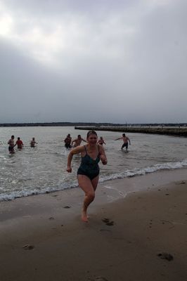Christmas Plunge
An ice-cold Christmas morning in Mattapoisett did not stop citizens from jumping all the way into the waters of Mattapoisett Town Beach in support of Helping Hands and Hooves. Photos by Mick Colageo December 29, 2022 edition
