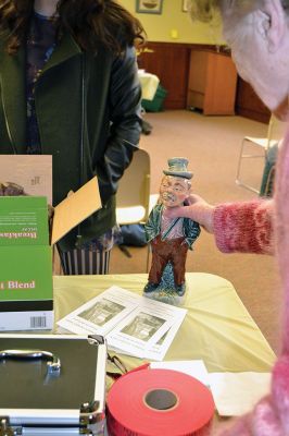 Library Treasures
Word spread of the Antiques Roadshow-style fundraiser at the Mattapoisett Library on March 29, attracting scores of South Coasters clutching their treasures, antiques, and heirlooms for appraisal and admiration, hoping Francis McNamee of the Marion Antique Shop might discover worth in their belongings beyond their sentimental value. Paying $5 per item appraised, some brought primitive dolls, old books, tea sets, and artwork. By Jean Perry
