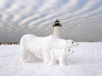 Polar Bear
Ruth and Rachel Bates attempted to simulate the feeling of the Arctic in Mattapoisett with their polar bear snow creations in late January 2011. Photo courtesy of Bodil Perkins. 
