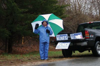 Rochester Elections
Selectman Richard Nunes braved a rainy election day, Wednesday April 13, 2011 in Rochester to greet voters on Dexter Lane. Selectman Nunes easily won reelection with 334 votes. Photo by Chris Martin.
