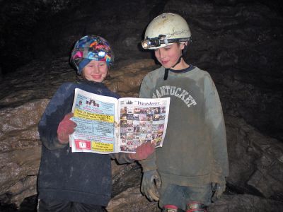 Cave Dwellers
Allie Arnfield and Justin Shay (both of Rochester) take a moment to read the latest news deep inside of Clarkesville Cave near Albany, NY. Tom Kinsky, Memorial School science teacher, led the eight-person group on a three-and-a-half hour crawl through the twists and turns of the cave system on January 17. (01/29/09 issue)
